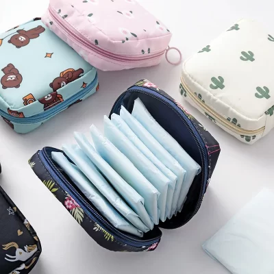 Bolsa de armazenamento de absorvente de guardanapo sanitário feminino portátil à prova d'água organizador bolsa padrão de desenho animado saco de guardanapo sanitário