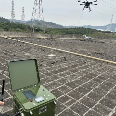 Heavy Lift Payload Tethered Cleaning Drone With Tether Power Base Station System